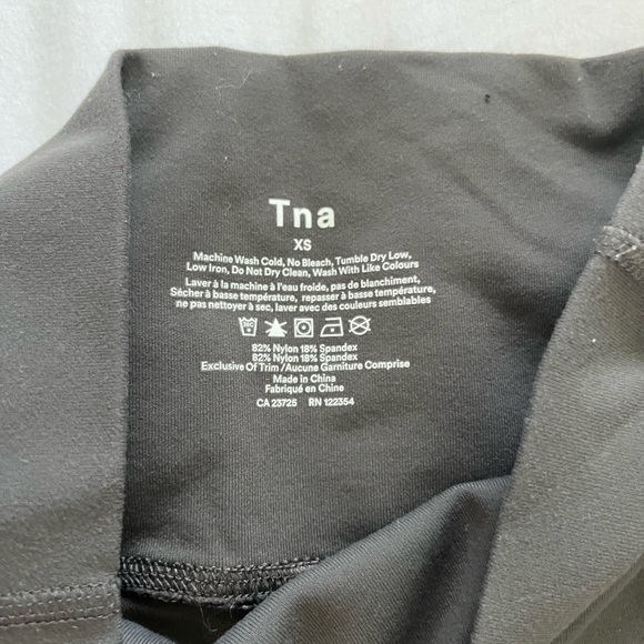 TNA dark grey leggings with stripe design on the side - Picture 4 of 6